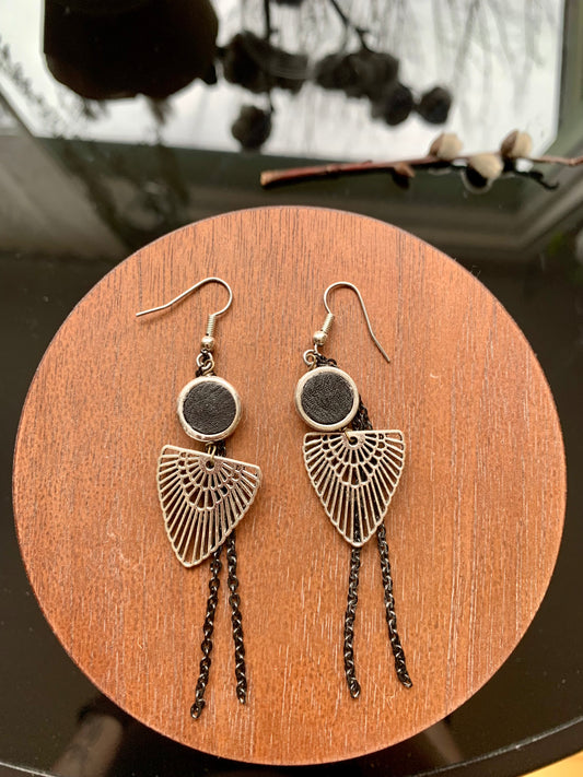 Earrings with black leather piece